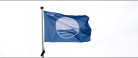 Blå flag og badepunkt på en række strande