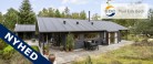 Arkitekttegnet kva­li­tets­som­mer­hus i naturskønne Lodskovvad – tæt på strand, golf og Råbjerg Mile